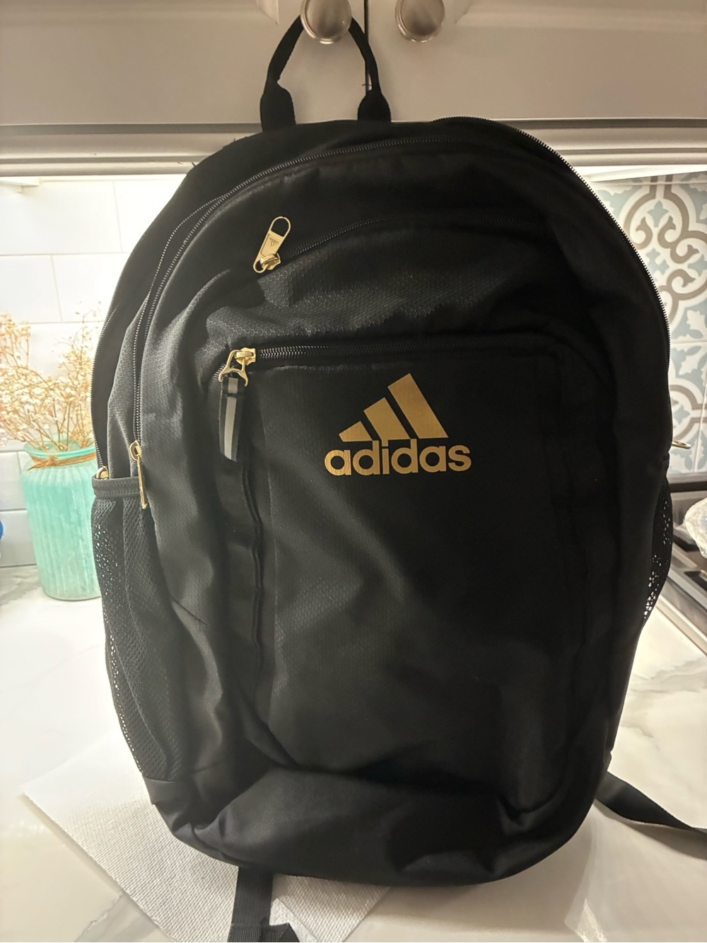 adidas Black Backpack with Gold Logo and Zippers